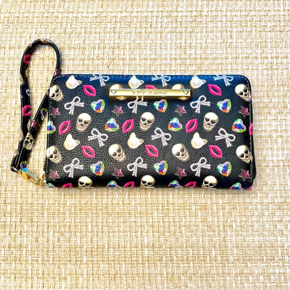 Betsey Johnson Handbags - NWOT Betsey Johnson Skulls and Bows Zip Around Wallet and Wristlet